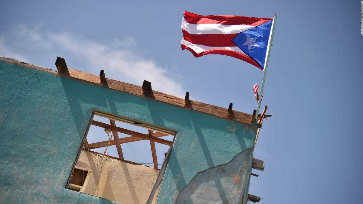 171004164139  getty  puerto  rico  flag  house  brought  down  by  hurricane  full  169 