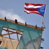 171004164139  getty  puerto  rico  flag  house  brought  down  by  hurricane  full  169 